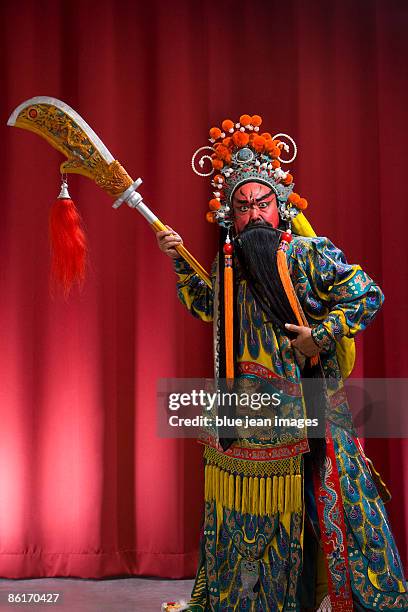 guang gong, ancient chinese general in beijing opera costume, represents protection and wealth - guan yu stock pictures, royalty-free photos & images