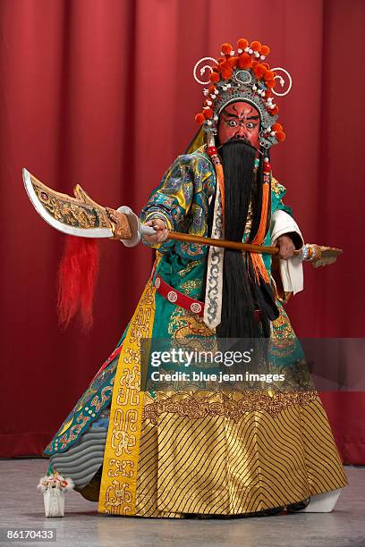 guang gong, ancient chinese general in beijing opera costume, represents protection and wealth - beijing opera stock pictures, royalty-free photos & images