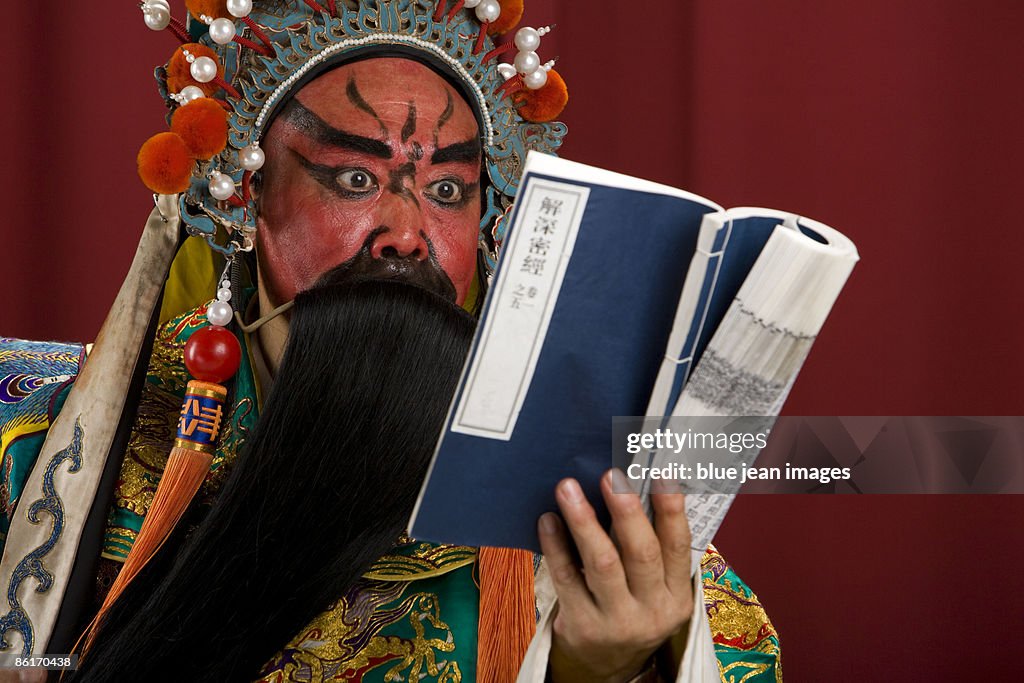 Guang Gong, Ancient Chinese General in Beijing Opera Costume, Represents Protection and Wealth