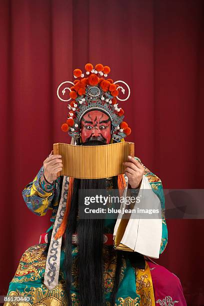 guang gong, ancient chinese general in beijing opera costume, represents protection and wealth - guan yu stock pictures, royalty-free photos & images