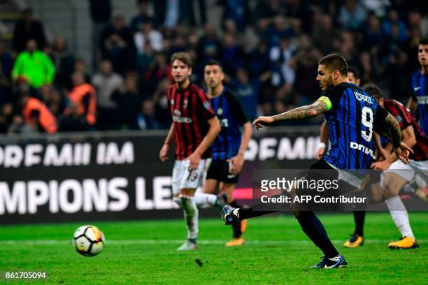 Inter Milan's Captain Argentinian forward Mauro Icardi kicks and score a penalty during the Italian Serie A football match Inter Milan Vs AC Milan on...