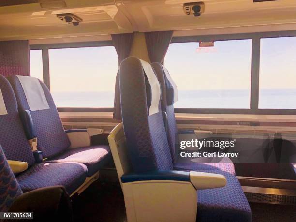 interior of a train car - train interior stock pictures, royalty-free photos & images