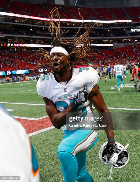 Walt Aikens of the Miami Dolphins reacts after their 20-17 win over the Atlanta Falcons at Mercedes-Benz Stadium on October 15, 2017 in Atlanta,...