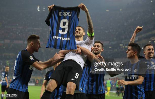 Mauro Emanuel Icardi of FC Internazionale Milano celebrates his third goal with his team-mates during the Serie A match between FC Internazionale and...