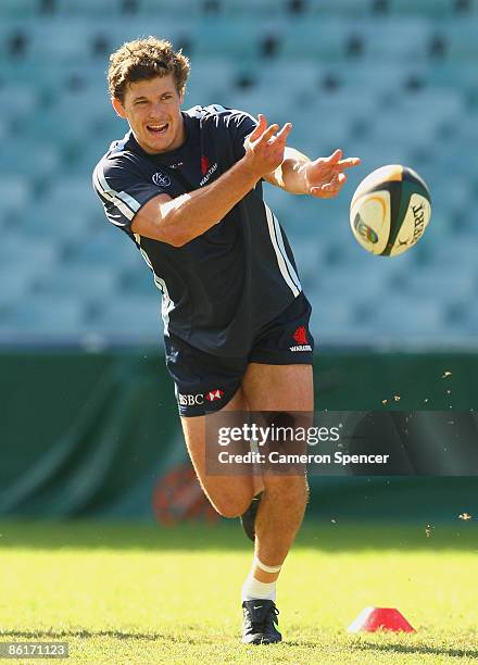 Luke Burgess of the Waratahs passes the ball during a Waratahs Super 14 training session at Sydney Football Stadium on April 23, 2009 in Sydney,...