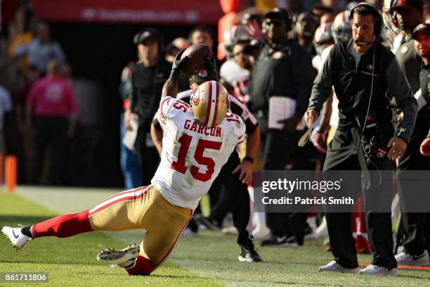 Wide receiver Pierre Garcon of the San Francisco 49ers makes a catch against the Washington Redskins during the fourth quarter at FedExField on...