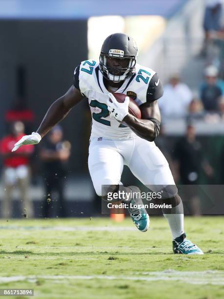 Leonard Fournette of the Jacksonville Jaguars runs with the football in the first half of their game against the Los Angeles Rams at EverBank Field...