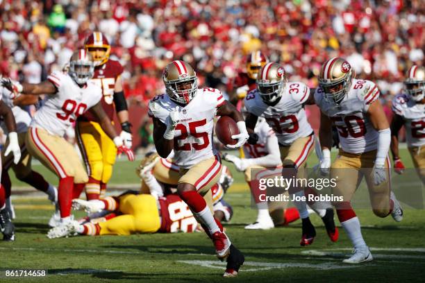 Jimmie Ward of the San Francisco 49ers runs with a fumble in the third quarter of a game against the Washington Redskins at FedEx Field on October...