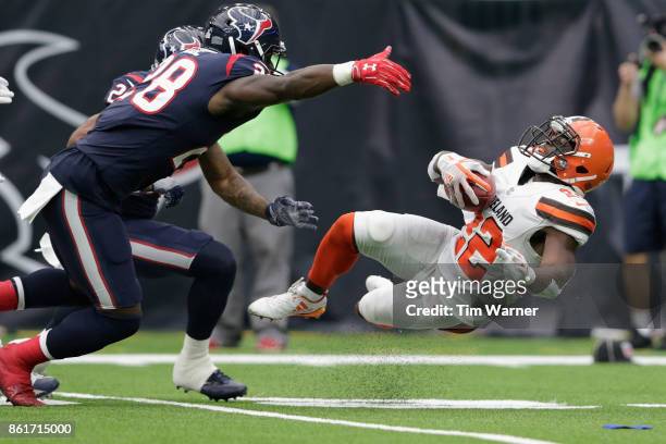 Jabrill Peppers of the Cleveland Browns returns a punt defended by Alfred Blue of the Houston Texans in the fourth quarter at NRG Stadium on October...