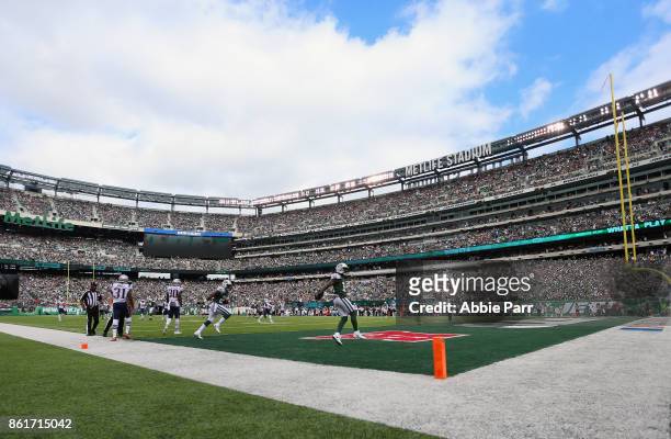 Wide receiver Jeremy Kerley of the New York Jets celebrates his run against the New England Patriots during the second quarter of their game at...