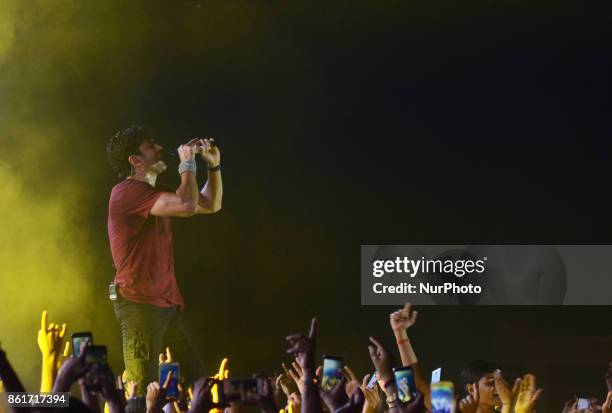 Indian bollywood actor and singer Farhan Akhtar performs during a live concert in Indian Institute of Information Technology , in Allahabad on...