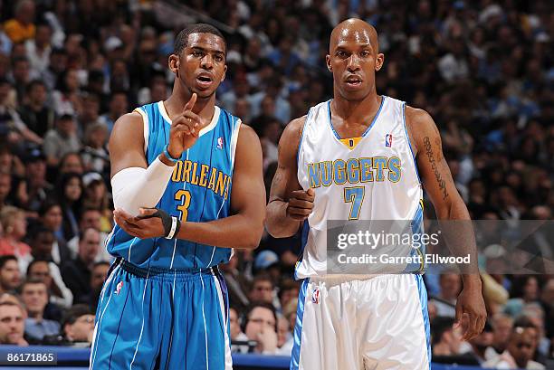 Chauncey Billups of the Denver Nuggets stands with Chris Paul of the New Orleans Hornets during Game Two of the Western Conference Quarterfinals...