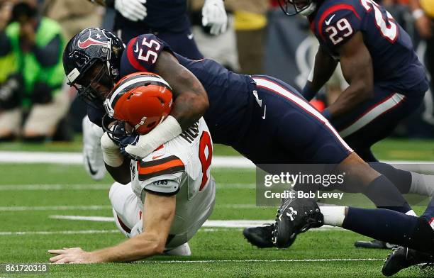 Kevin Hogan of the Cleveland Browns is sacked by Benardrick McKinney of the Houston Texans at NRG Stadium on October 15, 2017 in Houston, Texas.