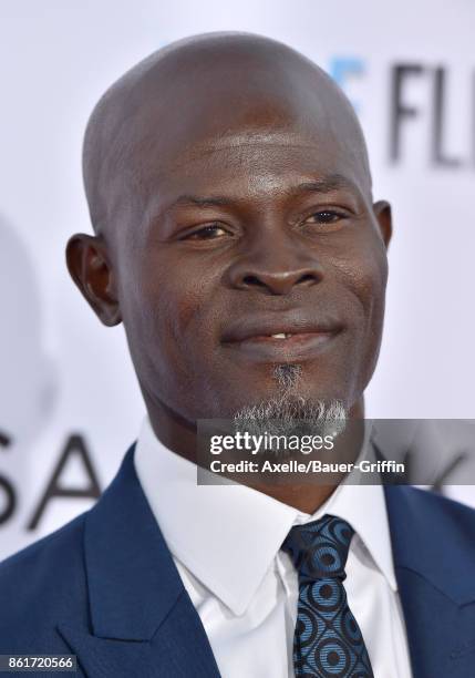 Actor Djimon Hounsou arrives at the premiere of 'Same Kind of Different as Me' at Westwood Village Theatre on October 12, 2017 in Westwood,...