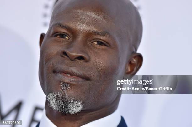 Actor Djimon Hounsou arrives at the premiere of 'Same Kind of Different as Me' at Westwood Village Theatre on October 12, 2017 in Westwood,...