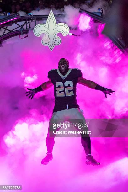 Mark Ingram II of the New Orleans Saints comes onto the field at pregrame before a game against the Detroit Lions at Mercedes-Benz Superdome on...