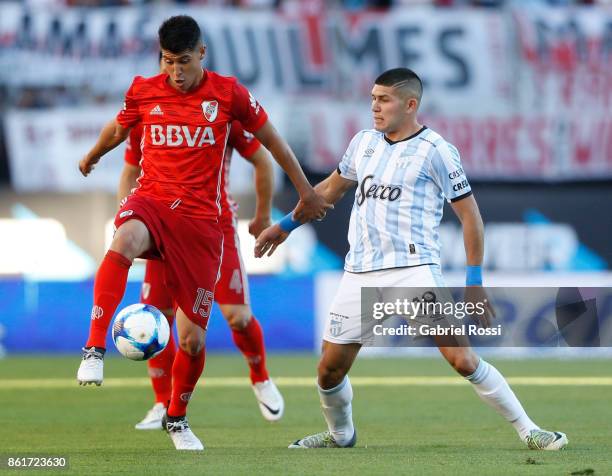 Exequiel Palacios of River Plate fights for the ball with David Barbona of Atletico de Tucuman during a match between River Plate and Atletico de...