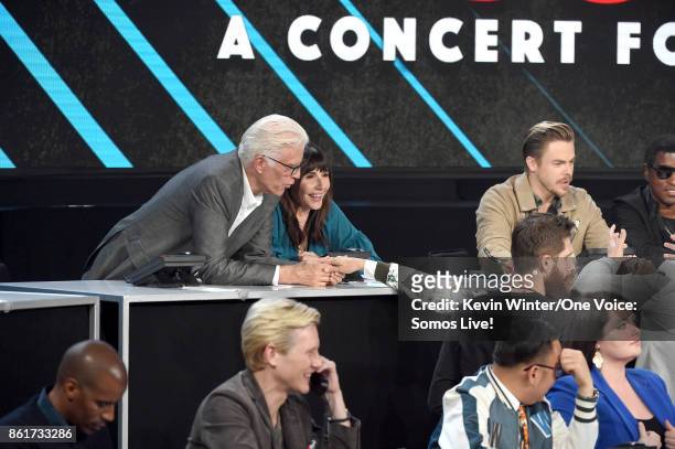 In this handout photo provided by One Voice: Somos Live!, actors Ted Danson and Mary Steenburgen participate in the phone bank onstage during "One...