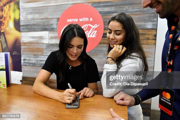 Chef Katie Lee signs her book Endless Summer Cookbook at the Food Network & Cooking Channel New York City Wine & Food Festival Presented By Coca-Cola...