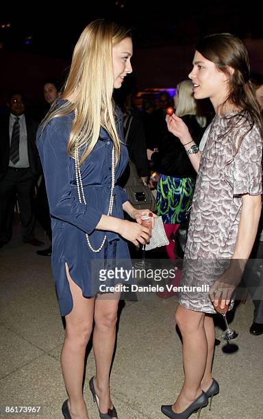Beatrice Borromeo and Charlotte Casiraghi attend the Stella McCartney and Established & Sons cocktail party held at the La Pelota as part of the 2009...