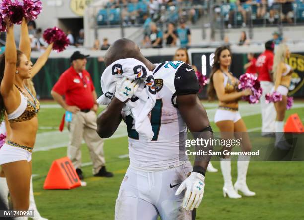 Leonard Fournette of the Jacksonville Jaguars walks to the bench area in the second half of their game against the Los Angeles Rams at EverBank Field...