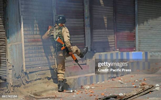 Policemen kicks shear gas shell towards protesters in habba kadal soon after mysterious braid chopping incident in the area .more then 100 braid...