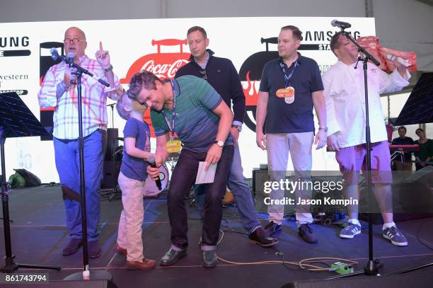 Host Andrew Zimmern, Gideon Scott Burtka-Harris, Host David Burtka, Andrew Zimmern and Pat LaFrieda, Mark Pastore and Chef Josh Capon on stage at the...