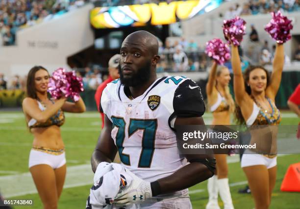 Leonard Fournette of the Jacksonville Jaguars walks to the bench area in the second half of their game against the Los Angeles Rams at EverBank Field...