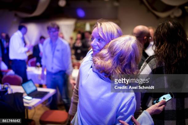 Dana Guth, top candidate of Germany's far right AfD party celebrates with supporters following initial results that give the AfD a finish with 6.2%...
