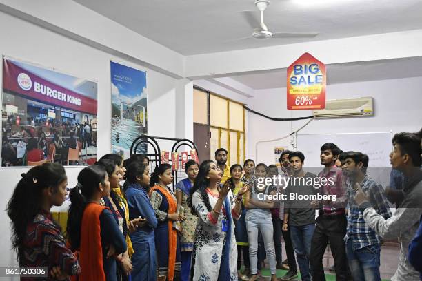 Students attend a retail class at an IACM Smart Learn Ltd. Learning center in New Delhi, India, on Tuesday, Oct. 10, 2017. By 2026, 64 percent of...