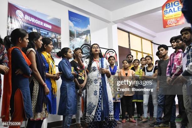 Students attend a retail class at an IACM Smart Learn Ltd. Learning center in New Delhi, India, on Tuesday, Oct. 10, 2017. By 2026, 64 percent of...