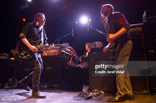 Michael Gira, Phil Puleo and Christopher Pravdica of Swans perform on stage at Sala Apolo on October 15, 2017 in Barcelona, Spain.