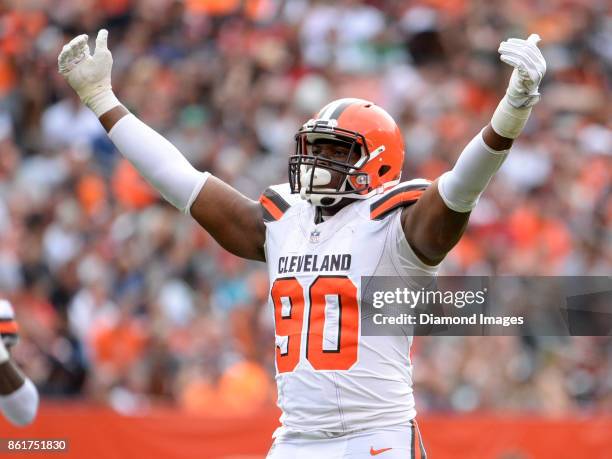 Defensive lineman Emmanuel Ogbah of the Cleveland Browns gestures toward the crowd in the second quarter of a game on October 8, 2017 against the New...