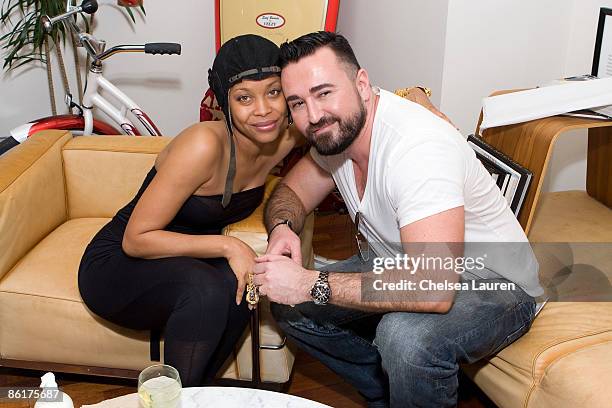 Singer / songwriter Erykah Badu and president of Kiehl's Chris Salgardo attend the launch of Limited Edition Superbly Restorative Argan Body Lotion...