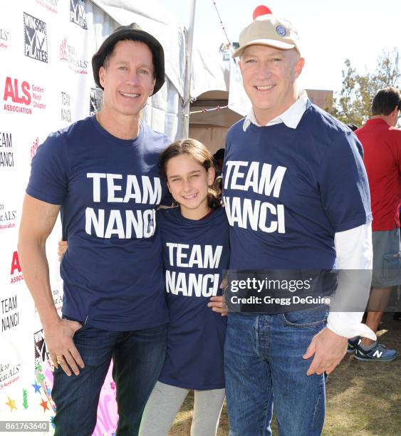 Bryan Lourd, Bruce Bozzi and daughter Ava attend Nanci Ryder's "Team Nanci" 15th Annual LA County Walk To Defeat ALS at Exposition Park on October...