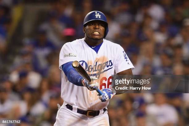 Yasiel Puig of the Los Angeles Dodgers reacts after hitting a foul ball in the sixth inning against the Chicago Cubs during game two of the National...