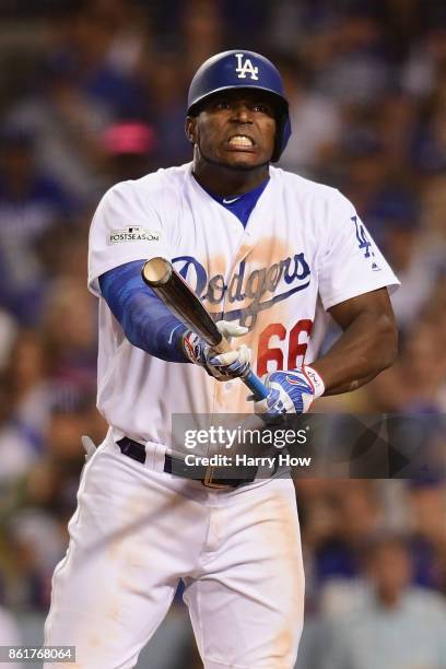 Yasiel Puig of the Los Angeles Dodgers reacts after hitting a foul ball in the sixth inning against the Chicago Cubs during game two of the National...