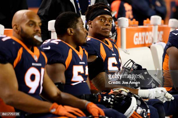 Brandon Marshall of the Denver Broncos sits on the bench as the Broncos struggle to get going against the New York Giants during the second quarter...