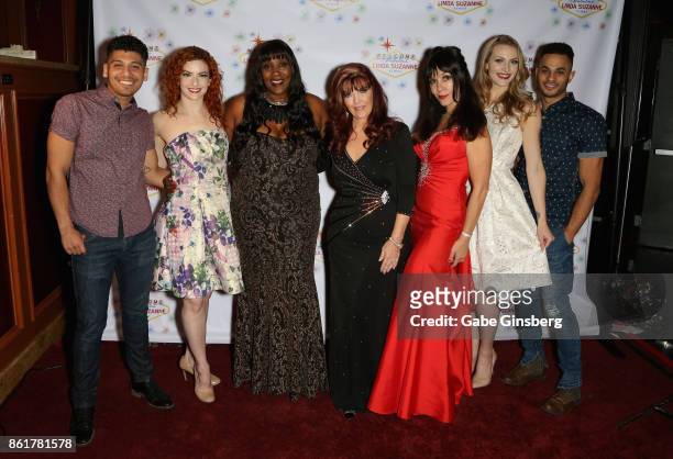 Singer Linda Suzanne poses with cast members dancer Henry Rivera, dancer/choreographer Alexi Irvine, singer Belinda Skinner, singer Sandy Martin,...