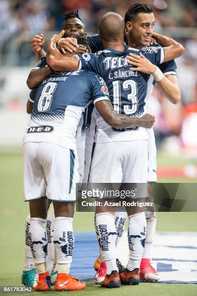 Aviles Hurtado of Monterrey celebrate with teammates after scoring his team's second goal during the 13th round match between Monterrey and Pachuca...