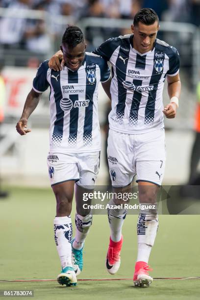 Aviles Hurtado of Monterrey celebrate with teammate Rogelio Funes Mori after scoring his team's second goal during the 13th round match between...