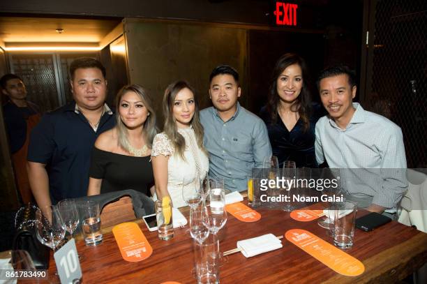 Guests attend a dinner with Masa Takayama as part of the Bank of America Dinner Series presented by The Wall Street Journal during Food Network &...