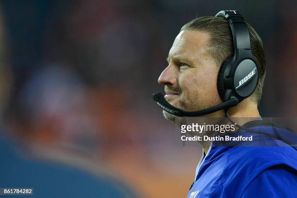 Head coach Ben McAdoo of the New York Giants looks on from the sideline during a game against the Denver Broncos at Sports Authority Field at Mile...