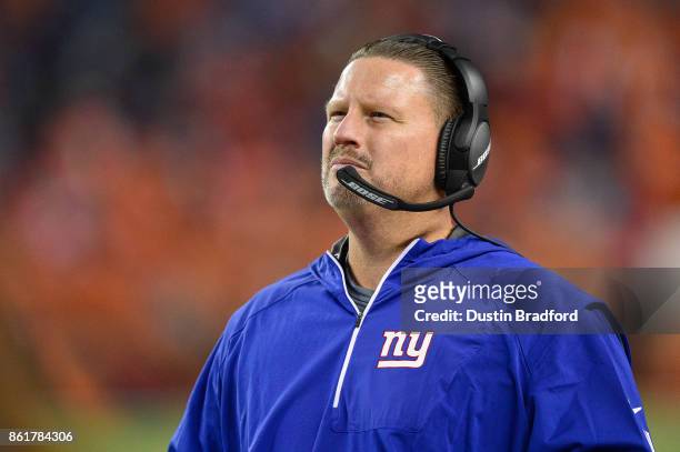 Head coach Ben McAdoo of the New York Giants looks on from the sideline during a game against the Denver Broncos at Sports Authority Field at Mile...