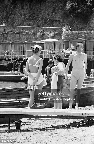 Holidaymakers on Paraggi Beach near the tourist resort of Portofino, Italy, August 1952. Original Publication : Picture Post - 6023 - unpub