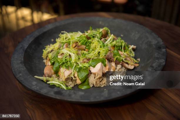 View of a dish being served during a dinner with Masa Takayama as part of the Bank of America Dinner Series presented by The Wall Street Journal...