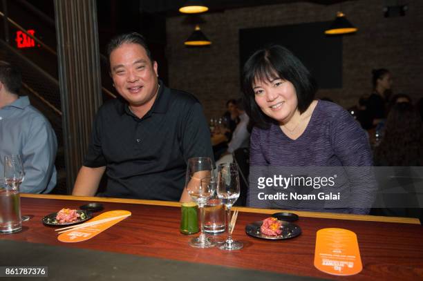 Guests attend a dinner with Masa Takayama as part of the Bank of America Dinner Series presented by The Wall Street Journal during Food Network &...
