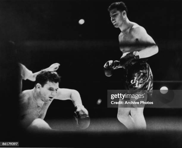 American boxer Joe Louis defeats World Heavyweight champion James J. Braddock in Chicago, 22nd June 1937.