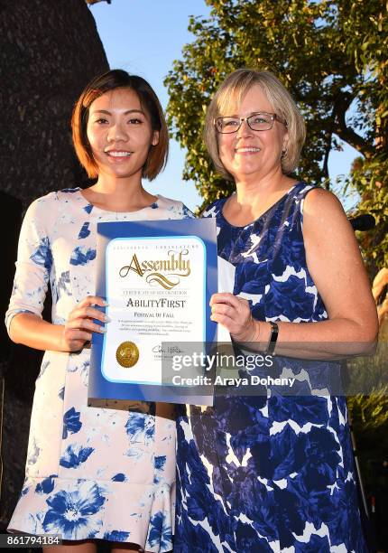 AbilityFirst CEO, Lori Gangemi and guest attend the AbilityFirst Festival of Fall on October 15, 2017 in Pasadena, California.