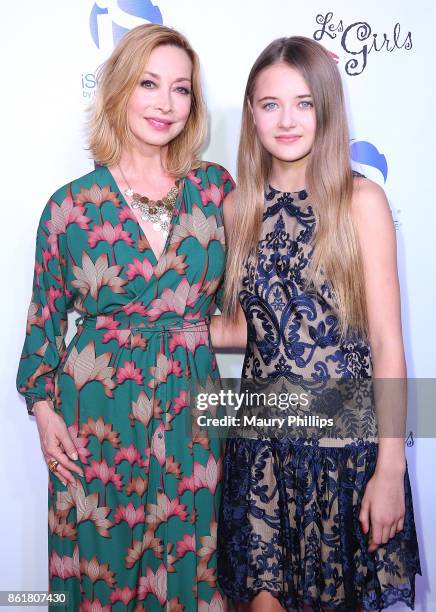 Sharon Lawrence and Raylynn Caster arrive at the 17th Annual "Les Girls" at Avalon on October 15, 2017 in Hollywood, California.